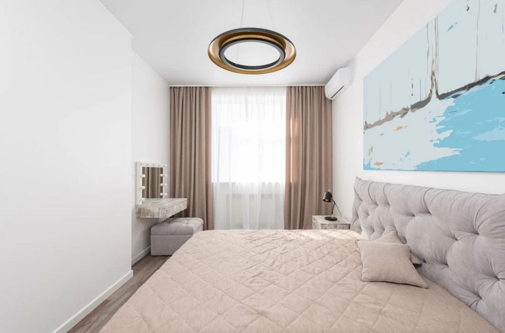Small apartment, daylight, cozy, large bed
