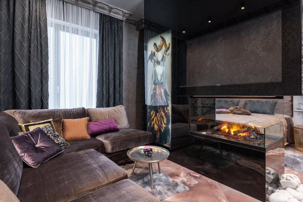 A warm cozy but very stylish livingroom of an apartment